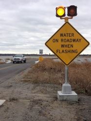Flooded Road Warning Sign