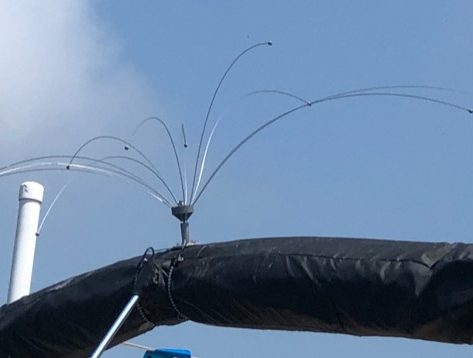 A “spider” made up of long lengths of wire installed to prevent nesting.